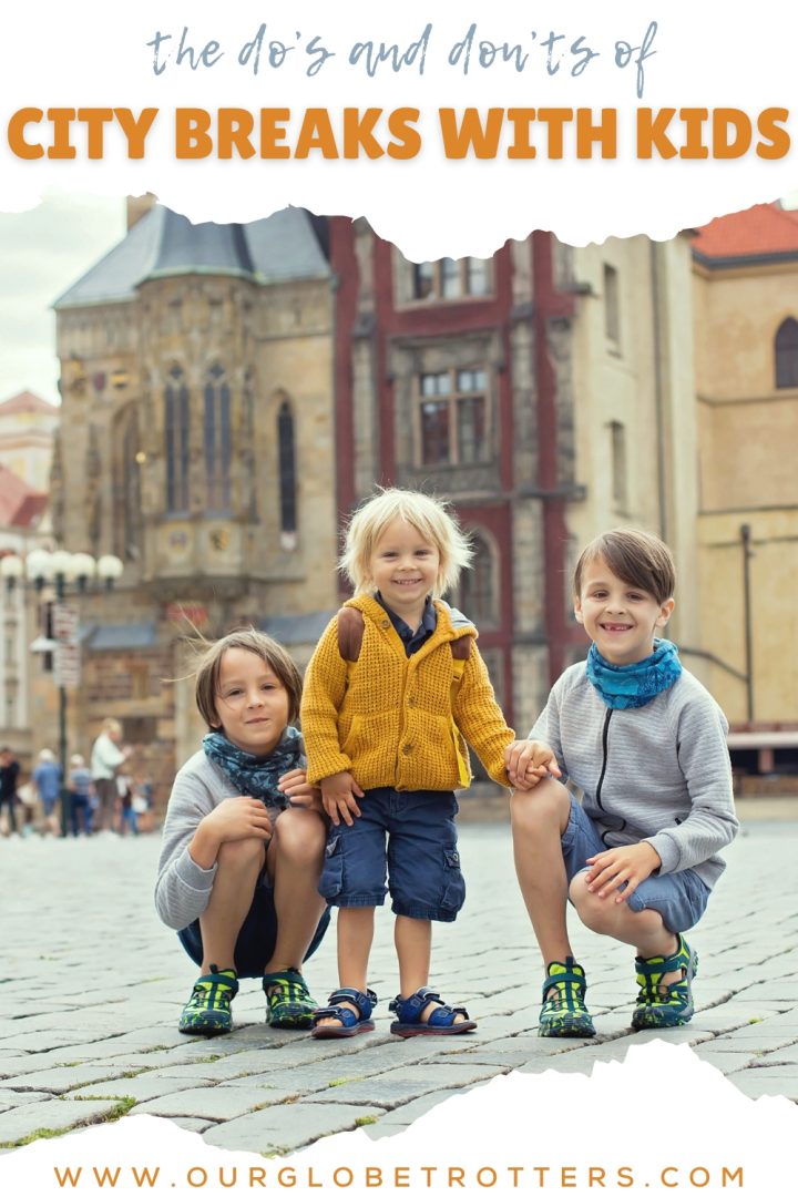 Three young children holding hands in an old european city text overlay The do's and don'ts of city breaks with kids